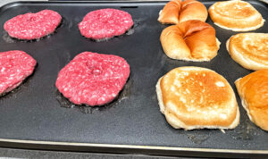 Griddle lamb burgers and toasting buns