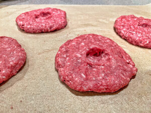 Lamb burgers ready to griddle