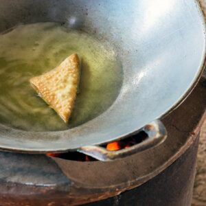 Wonton wrapper frying in oil
